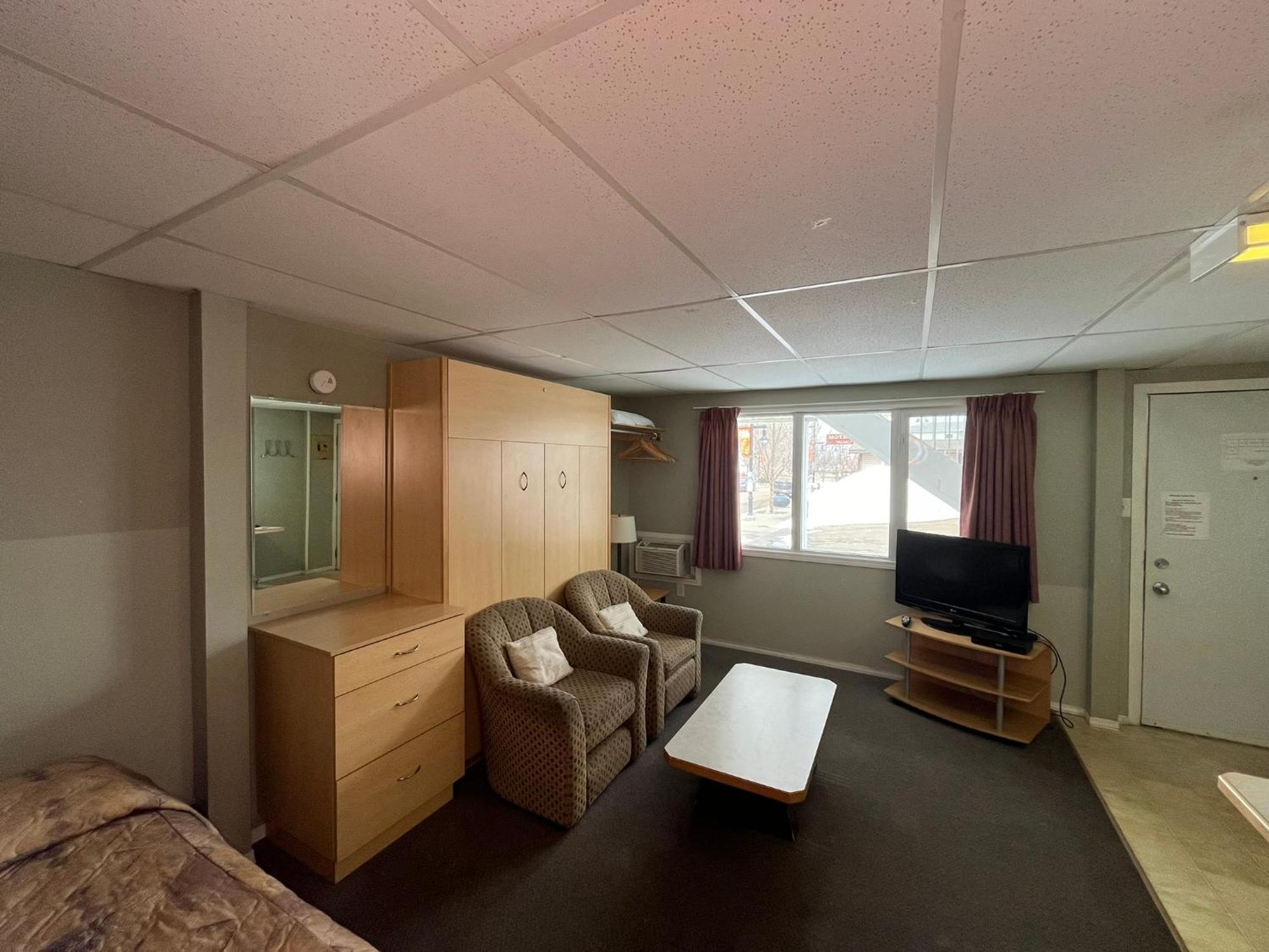 Raccoon Lodge Motel Sylvan Lake Rom bilde