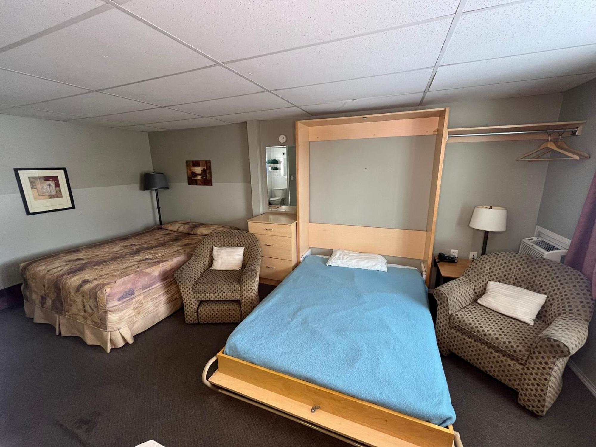 Raccoon Lodge Motel Sylvan Lake Rom bilde