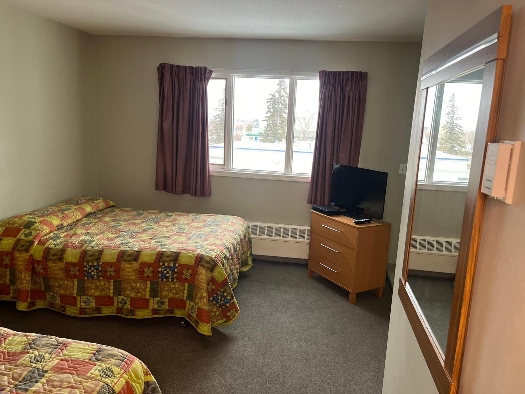 Raccoon Lodge Motel Sylvan Lake Rom bilde