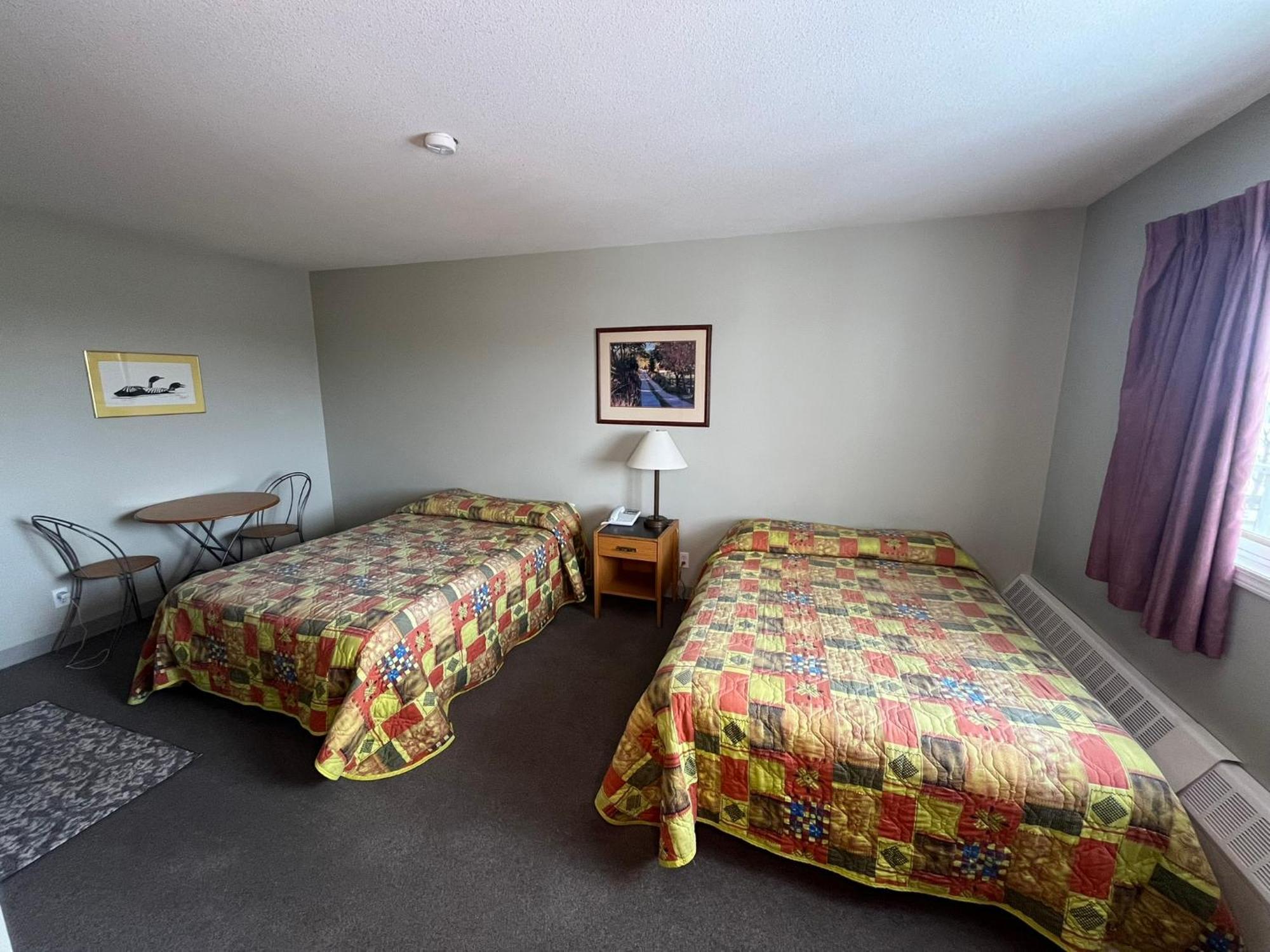 Raccoon Lodge Motel Sylvan Lake Rom bilde