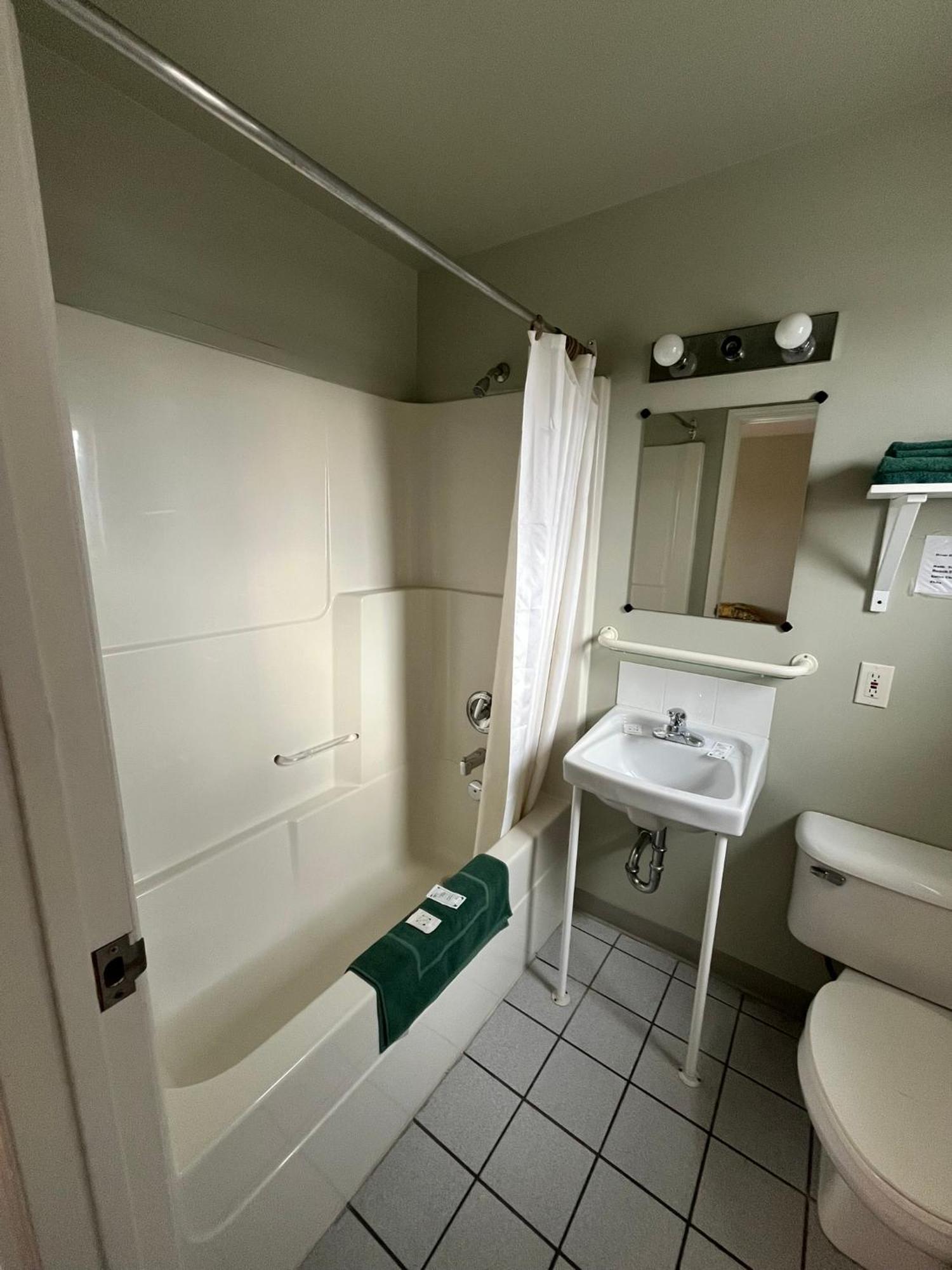Raccoon Lodge Motel Sylvan Lake Rom bilde